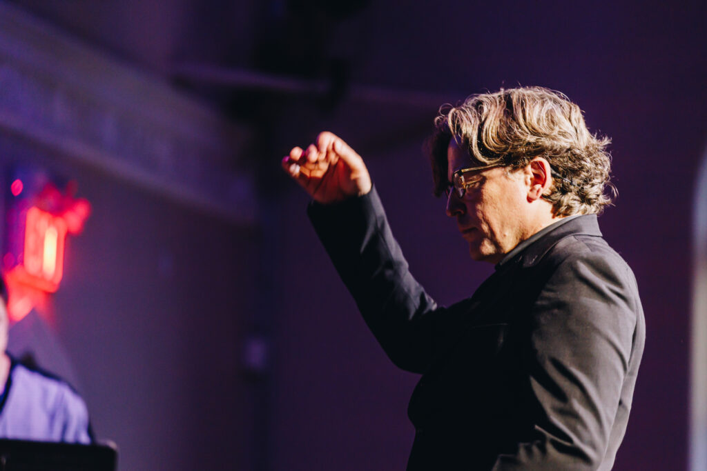 Brian Current, Conductor (Photo: Green Yang)